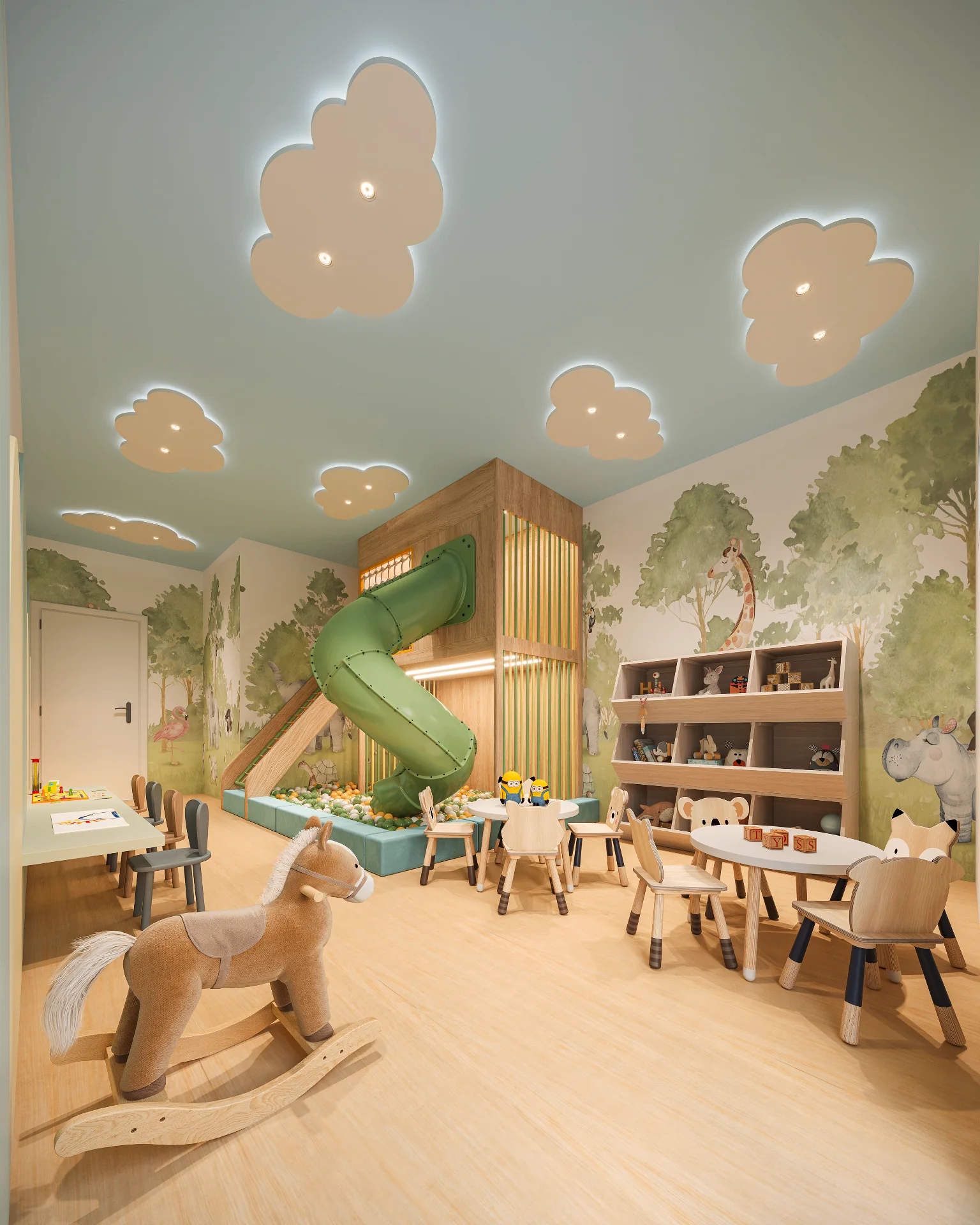 Brinquedoteca do Palazzo Milano com tobogã verde, piscina de bolinhas, mural de safari e luminárias em forma de nuvem